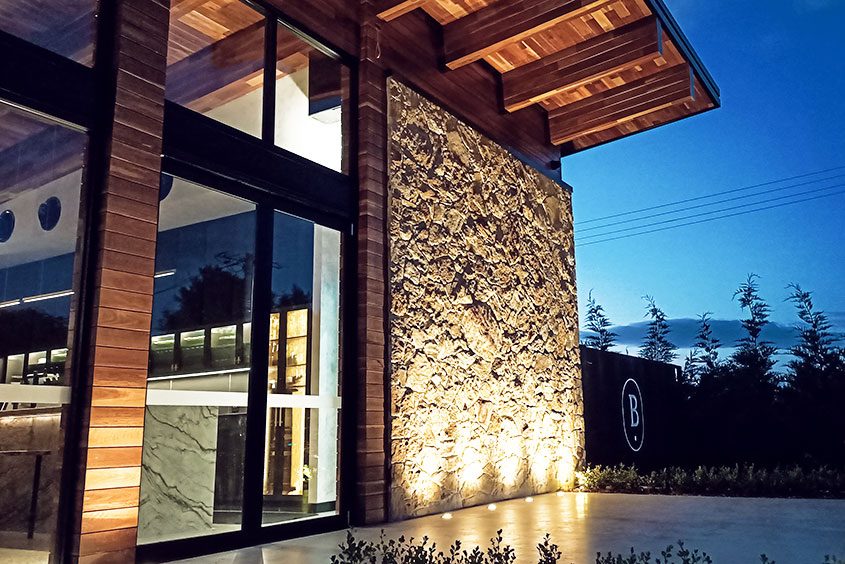 Close up of glass and stone architectural detail with precision framing